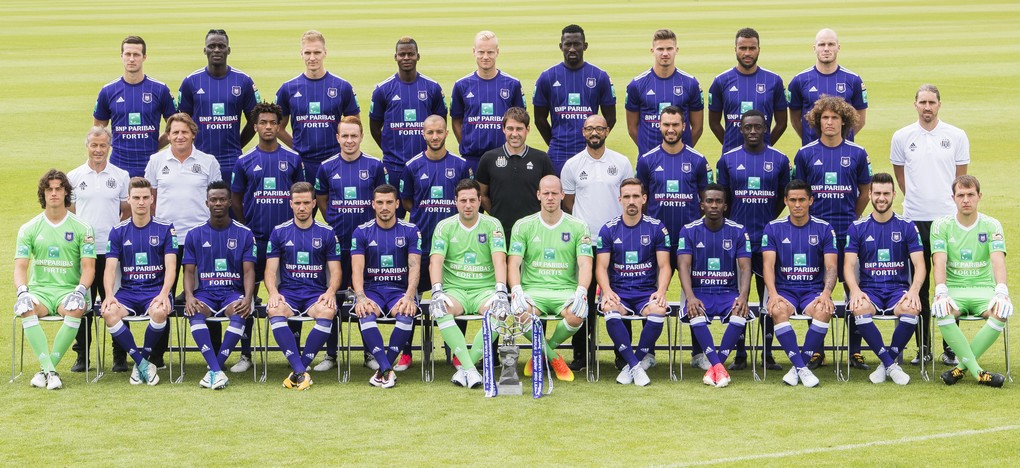 Third row (L to R) : 05 Anderlecht's Uros Spajic, Anderlecht's Kara Mbodji, Anderlecht's Lukasz Teodorczyk, Anderlecht's Idrissa Doumbia, Anderlecht's Olivier Deschacht, Anderlecht's Silvere Ganvoula, Anderlecht's Leander Dendoncker, Anderlecht's Isaac Kiese Thelin, Anderlecht's Bram Nuytinck, Second row (L to R) : Anderlecht's physical trainer Thomas Binggeli, Anderlecht's keeper trainer Max de Jong, Anderlecht's Hannes Delcroix, Anderlecht's Adrien Trebel, Anderlecht's Sofiane Hanni, Anderlecht's head coach Rene Weiler, Anderlecht's team manager Gunther Van Handenhoven, Anderlecht's Ivan Obradovic, Anderlecht's Dennis Appiah, Anderlecht's Wout Faes, Anderlecht's assistant coach Nicolas Frutos, First row (L to R) :45 Anderlecht's goalkeeper Mile Svilar, Anderlecht Pieter Gerkens, Anderlecht's Emmanuel Sowah, Anderlecht's Alexandru Chipciu, Anderlecht's Nicolae-Claudiu Stanciu, Anderlecht's goalkeeper Frank Boeckx and Anderlecht's goalkeeper Matz Sels Anderlecht's Sven Kums, Anderlecht's Henry Onyekuru, Anderlecht's Andy Najar, Anderlecht's Massimo Bruno, Anderlecht's goalkeeper Davy Roef pose for the photographer at the 2017-2018 season photo shoot of Belgian first league soccer team RSC Anderlecht, Tuesday 11 July 2017 in Brussels. BELGA PHOTO LAURIE DIEFFEMBACQ