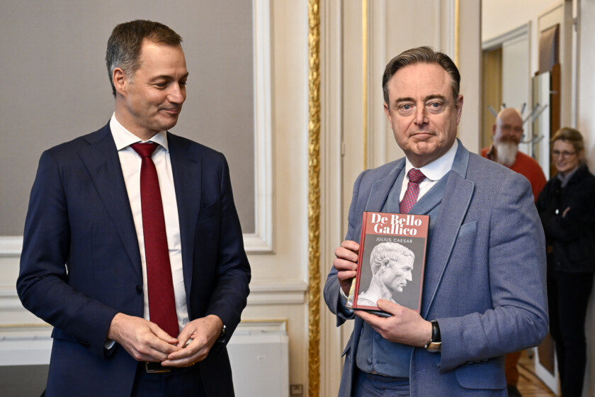 Outgoing Prime Minister Alexander De Croo and Newly appointed Prime Minister Bart De Wever pictured during the passing of power to the new Minister, at the Prime Minister's cabinet, Monday 03 February 2025, in Brussels. Negotiators from the five parties that make up the Arizona coalition - the N-VA, MR, Engagés, Vooruit and CD&V - reached a government agreement on Friday evening. BELGA PHOTO DIRK WAEM