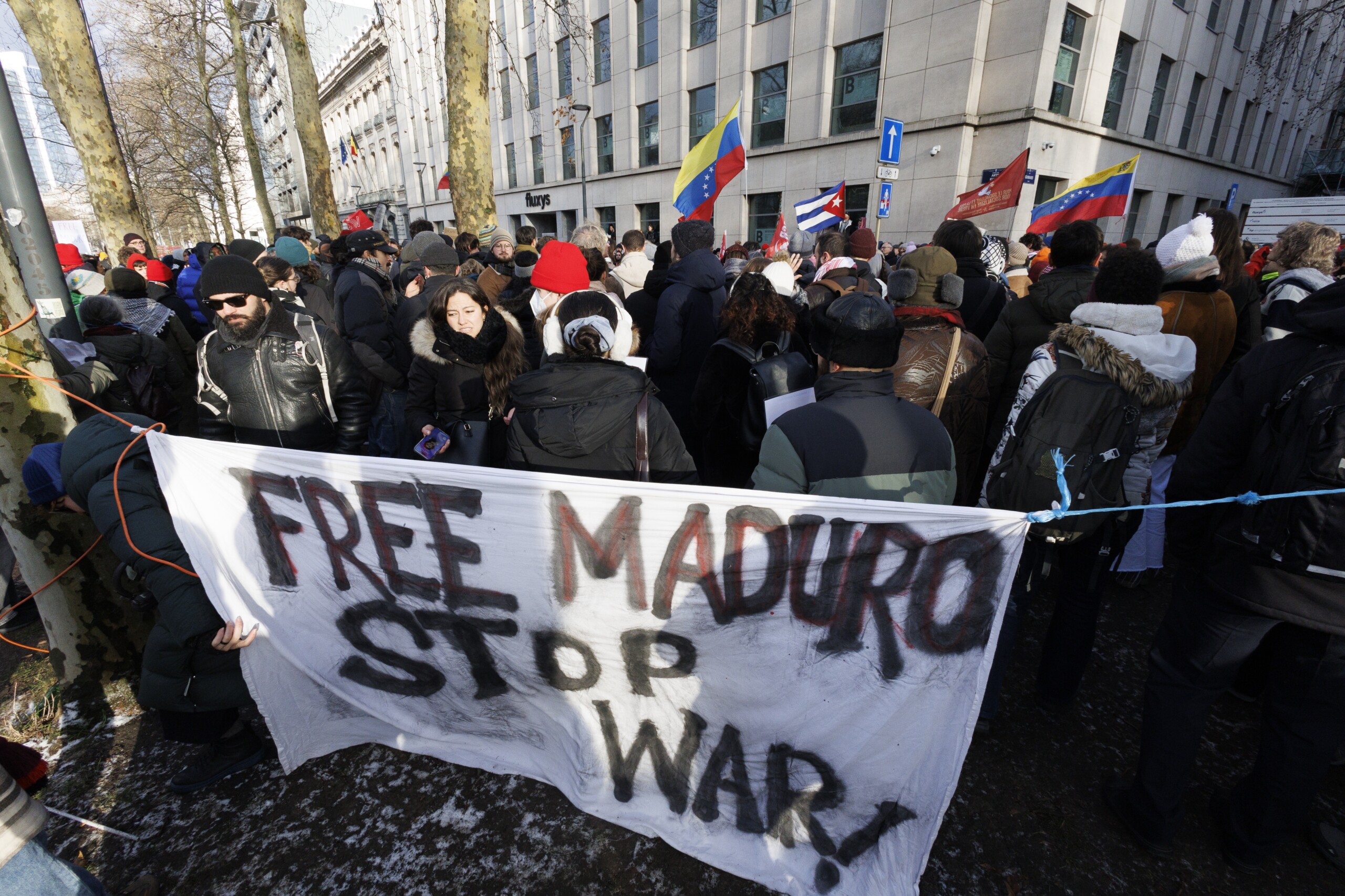 A protest action is organized in front of the embassy of United States to Belgium, in Brussels, Sunday 04 January 2026. BELGA PHOTO NICOLAS MAETERLINCK